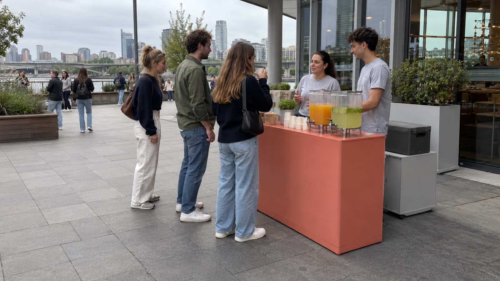 Visitors trying drinks at an outdoor sampling activation