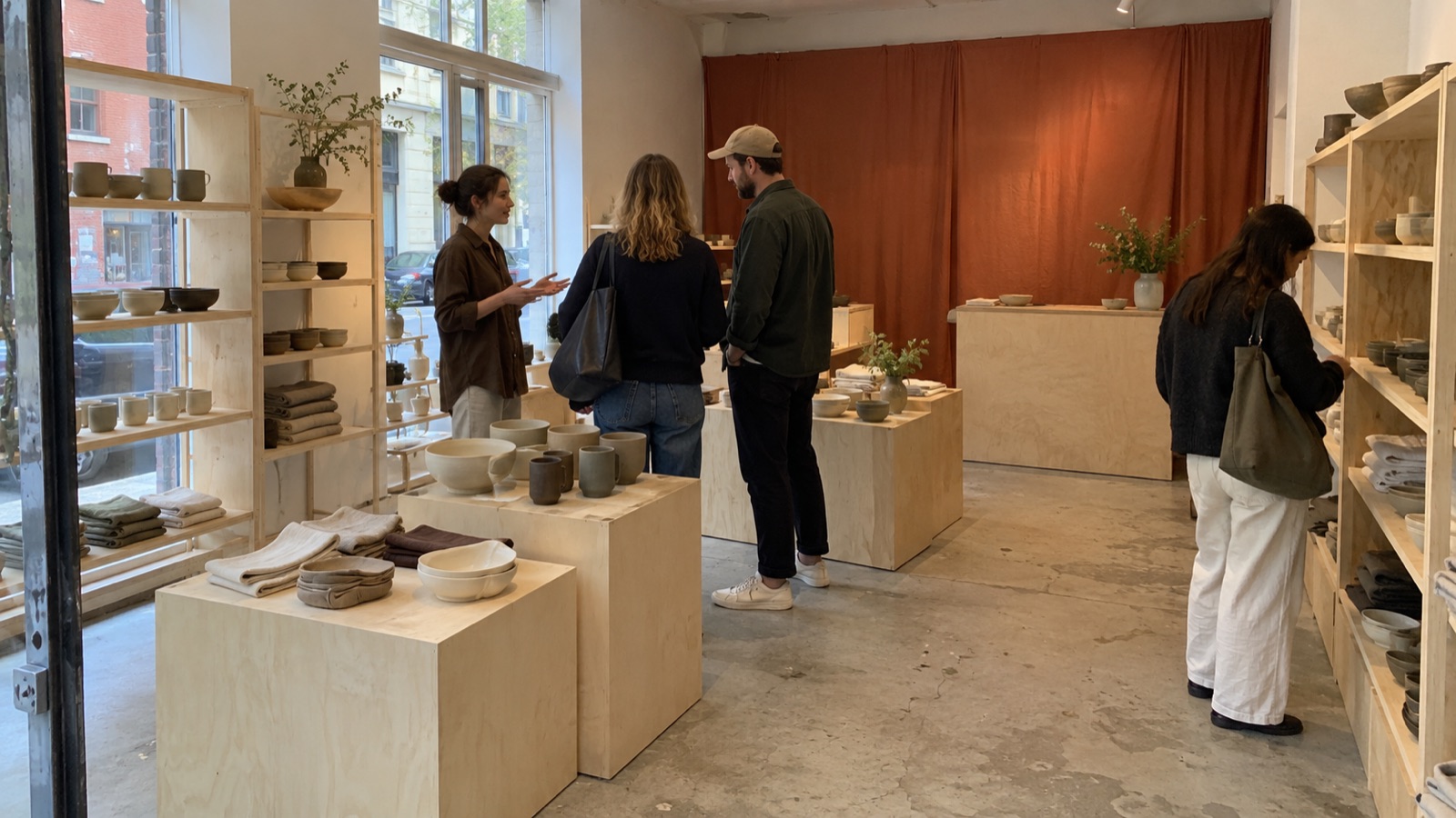 Visitors exploring homeware displays at a temporary pop-up space