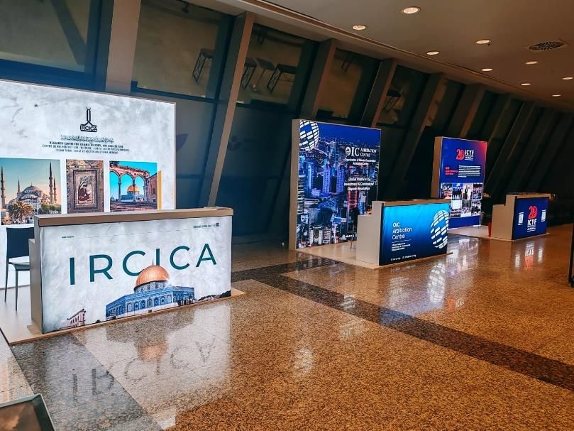 Institutional information counters in a conference foyer
