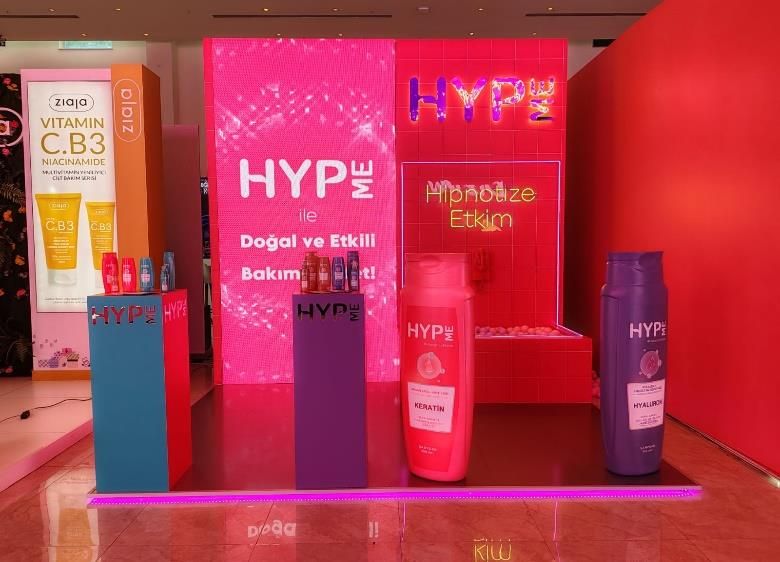 HYPE ME cosmetics display with oversized product replicas
