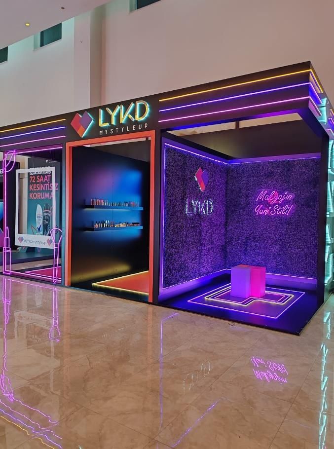 Illuminated experience area at a LYKD cosmetics display