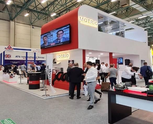 Visitor discussions at a MOTRIO stand