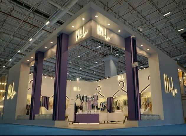 Tall-framed stand with product racks